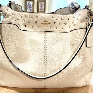 Coach leather handbag in white.